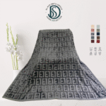 Soft luxury blanket 220x240 cm in cream color, neatly folded, showing smooth texture.