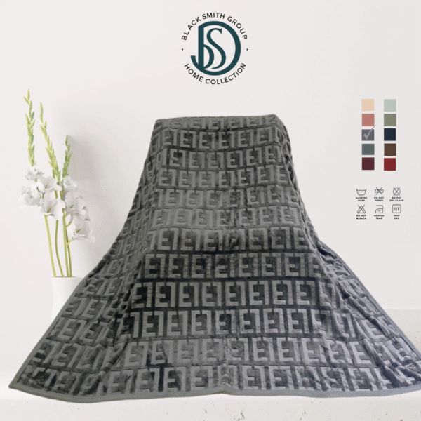 Soft luxury blanket 220x240 cm in cream color, neatly folded, showing smooth texture.