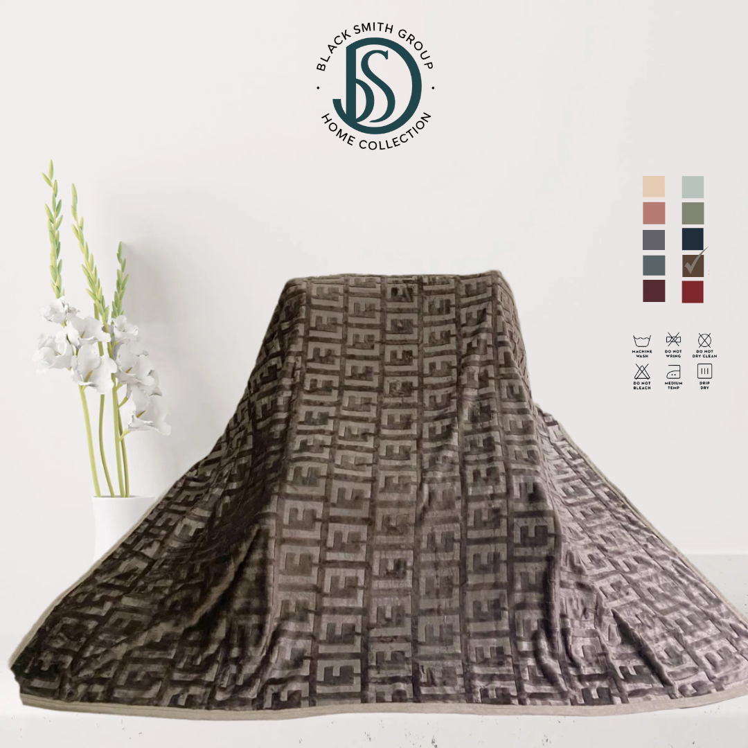 Soft luxury blanket 220x240 cm in cream color, neatly folded, showing smooth texture.