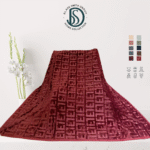 Soft luxury blanket 220x240 cm in cream color, neatly folded, showing smooth texture.