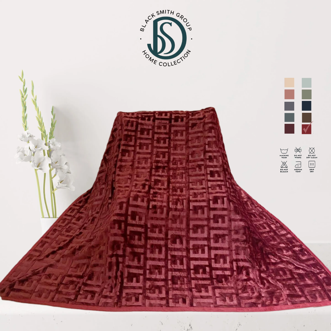 Soft luxury blanket 220x240 cm in cream color, neatly folded, showing smooth texture.